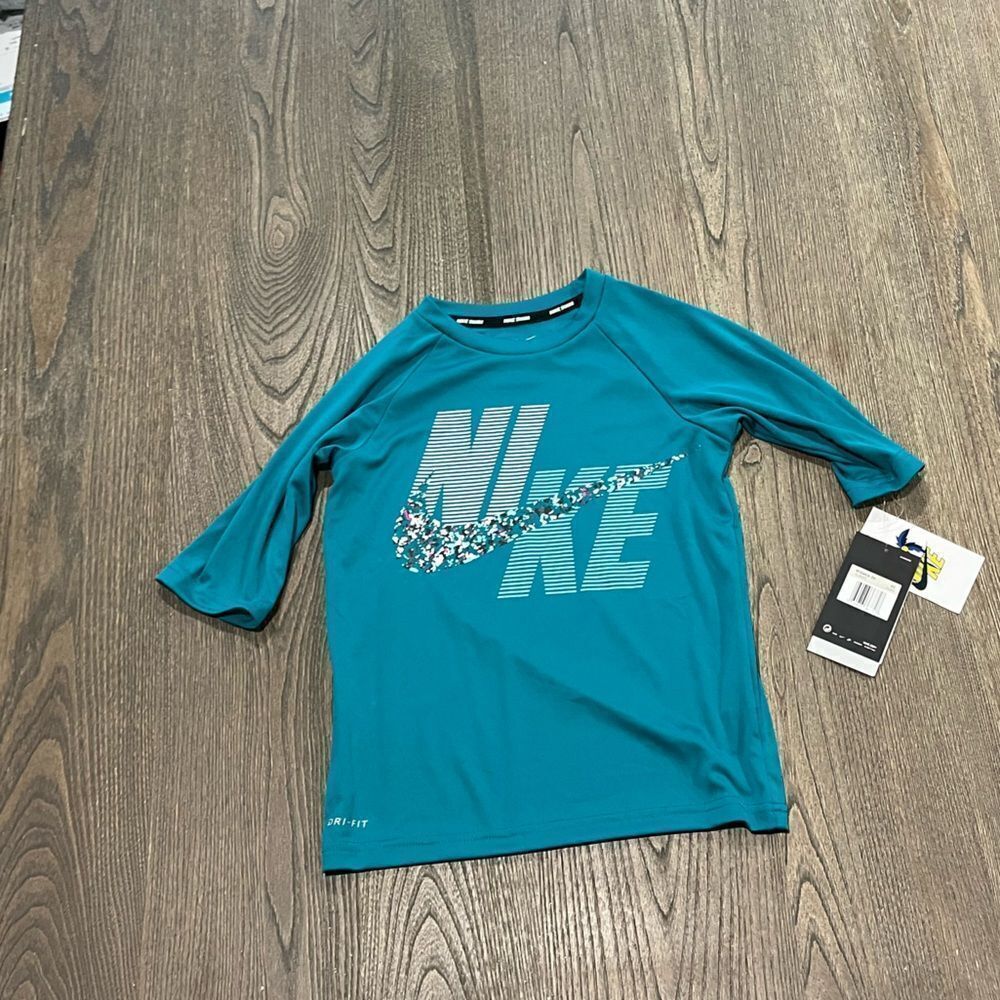 NWT Nike Dri-FIT Kids Teal Long Sleeve Graphic Shirt Size XS